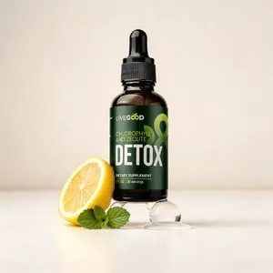 Flacon compte-gouttes en verre ambré de gouttes Détox Chlorophylle et Zéolite LiveGood sur VitalieBio, avec une tranche de citron et de la menthe pour une cure de purification naturelle.